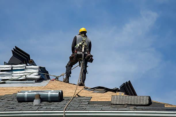 Professional Roofing technician working in Marion, MA
